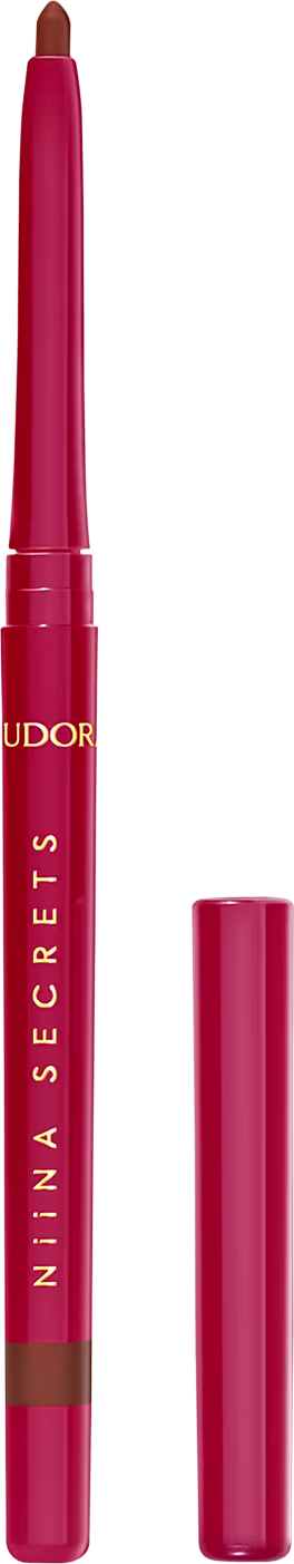 Lápis labial vermelho da marca Eudora com embalagem cilíndrica e tampa rosada, exibindo o nome da marca em letras douradas.
