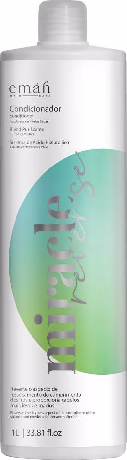 Condicionador Emáh Hair Care em frasco branco com rótulo verde e azul, contendo 1L do produto. Destaca o sistema de ácido hialurônico e blend purificante para revitalizar os cabelos.