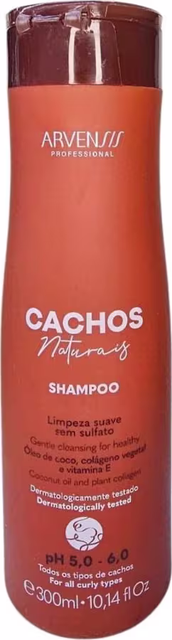 Frasco de shampoo da linha Cachos Naturais da marca Arvensis Professional, em embalagem laranja com tampa marrom, contendo 300ml do produto.