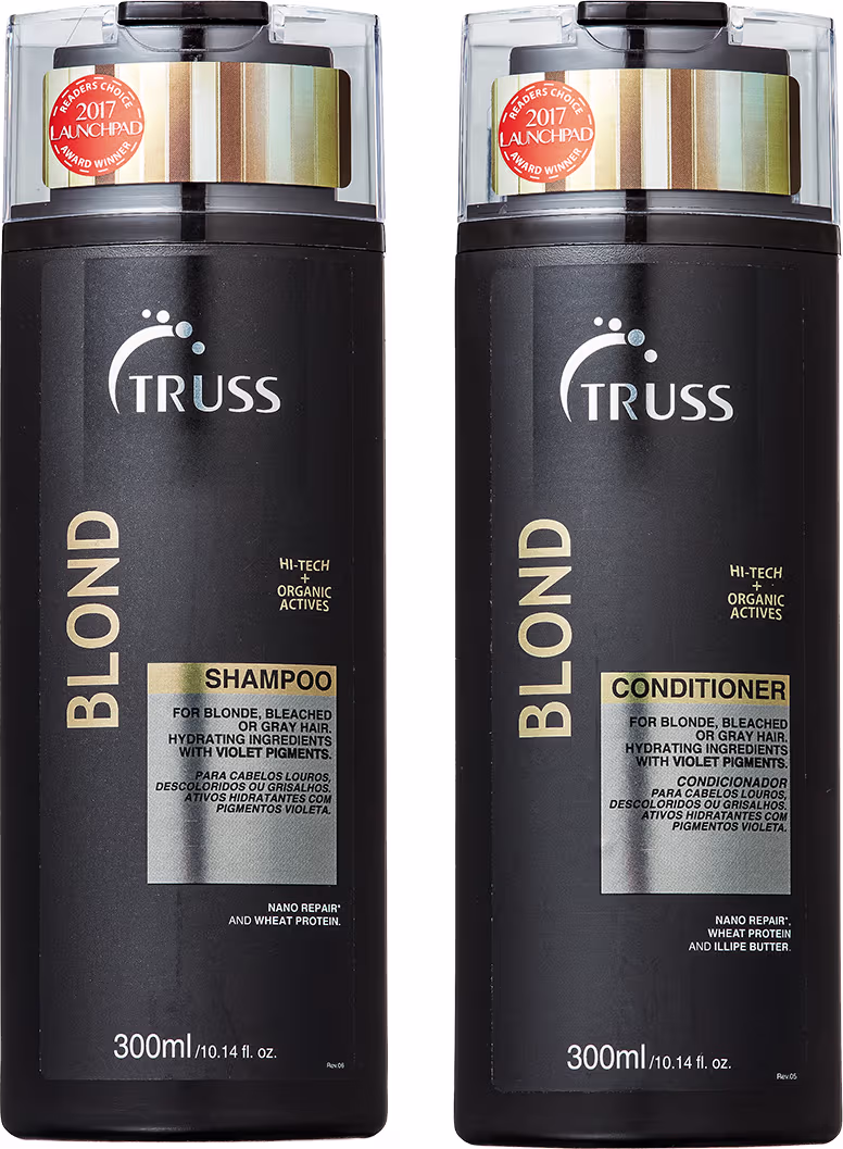 Dois frascos de shampoo e condicionador da marca Truss. Embalagens plásticas pretas com detalhes em prata. Tamanho de 300ml indicado nos rótulos.