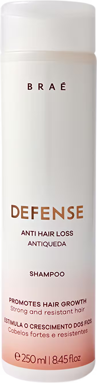 Frasco branco cilíndrico da marca Braé, contendo 250 ml de shampoo "Defense Anti Hair Loss Antiqueda" para promover o crescimento capilar.