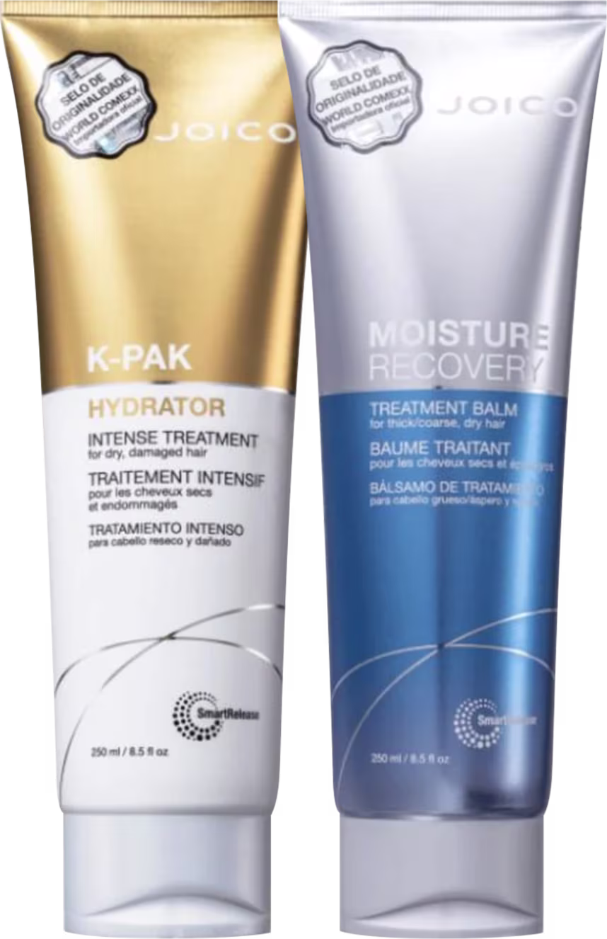 A imagem mostra duas máscaras capilares. À esquerda, um frasco dourado e branco com o nome "K-PAK Hydrator". À direita, um frasco prata  e azul com o nome "Moisture Recovery Treatment". Ambos os frascos têm 250ml.