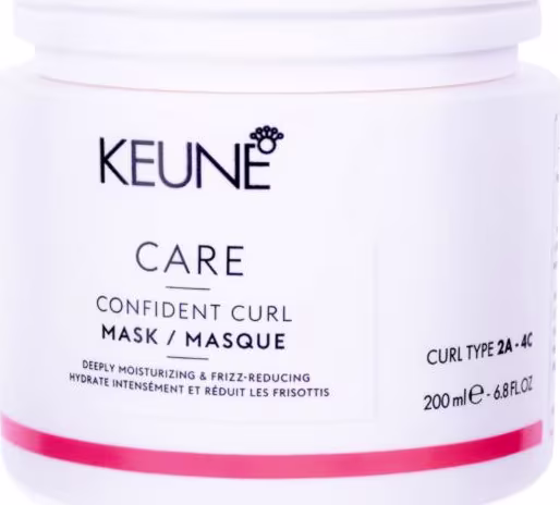 O produto apresentado é um pote branco da marca Keune, contendo uma máscara para cabelos encaracolados chamada "Confident Curl Mask". O pote possui uma tampa branca e contém 200 ml do produto.