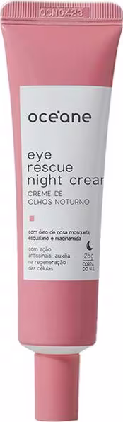 A imagem mostra a embalagem do Océane Eye Rescue Night Cream. O produto vem em um tubo plástico na cor rosa goiaba com um rótulo branco e letras pretas descrevendo nome e marca.