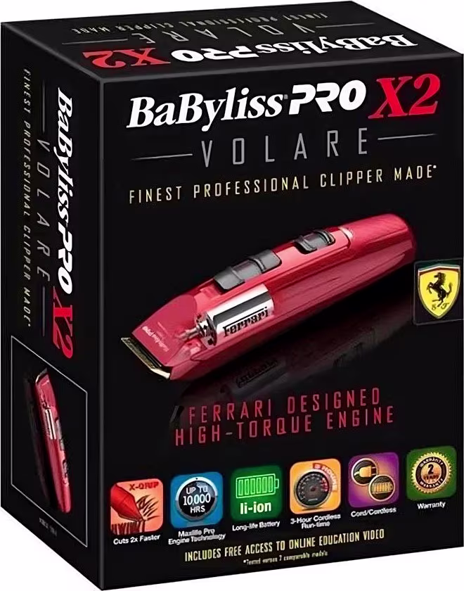 Máquina de corte da marca BaByliss PRO X2 Volare. A embalagem é uma caixa preta com detalhes em vermelho e branco. O aparador em destaque é vermelho com detalhes prateados. A caixa exibe o logotipo da Ferrari, indicando uma parceria de design.