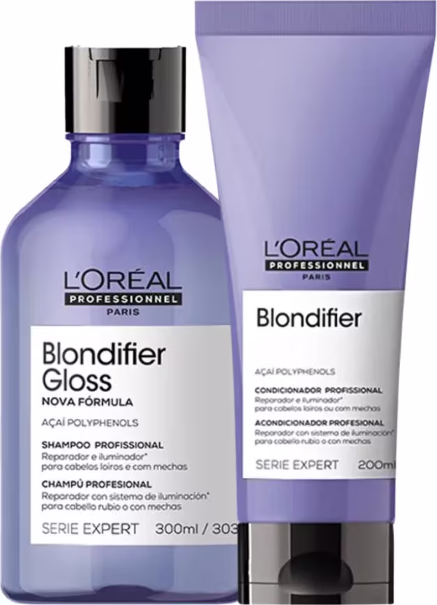 A imagem mostra dois produtos da linha Blondifier da L'Oréal Professionnel. Um shampoo em um frasco azul transparente de 300ml e um condicionador em um tubo roxo opaco de 200ml.