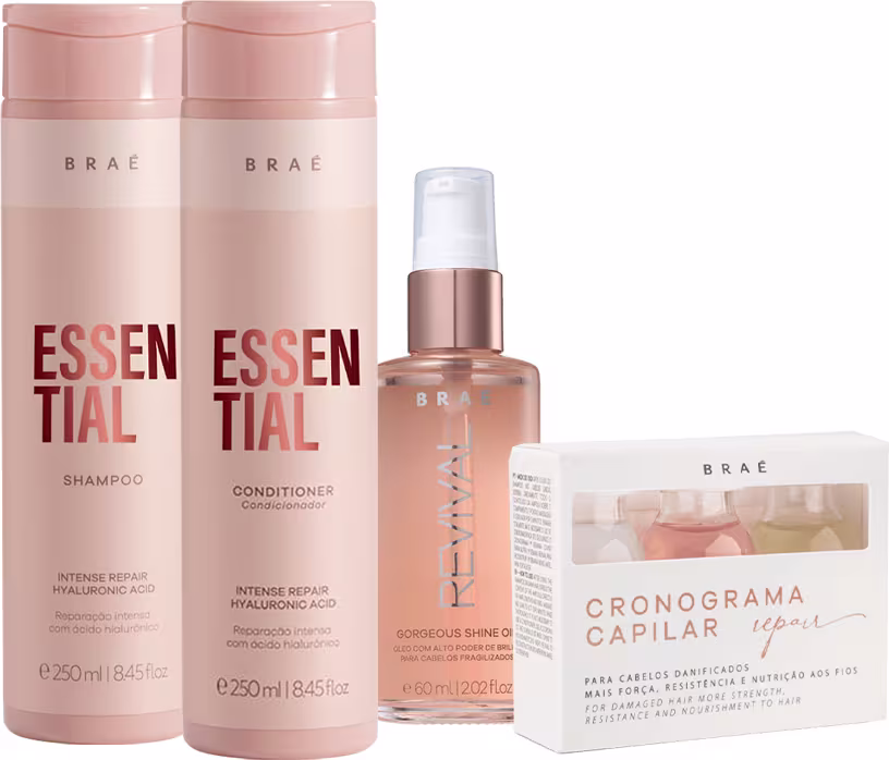 Dois frascos de shampoo e condicionador da linha Essential da marca Braé, com embalagens em tons de rosa e rótulos em vermelho. Também há um frasco de sérum Revital e uma caixa com o Cronograma Capilar da mesma marca.