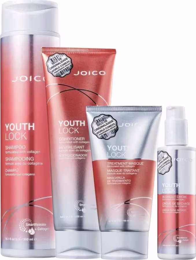 A imagem mostra uma linha de produtos para cabelos da marca Joico chamada "Youth Lock". Inclui um shampoo, um condicionador, uma máscara e um leave-in. As embalagens apresentam tom de laranja com prata.