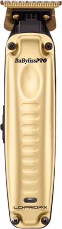 Aparelho de aparar cabelo BaBylissPRO. Corpo dourado com detalhes pretos. Lâminas expostas na parte superior. Logotipo "BaBylissPRO" e "Lo-Pro FX" visíveis no corpo. Design ergonômico com ranhuras para firme aderência.