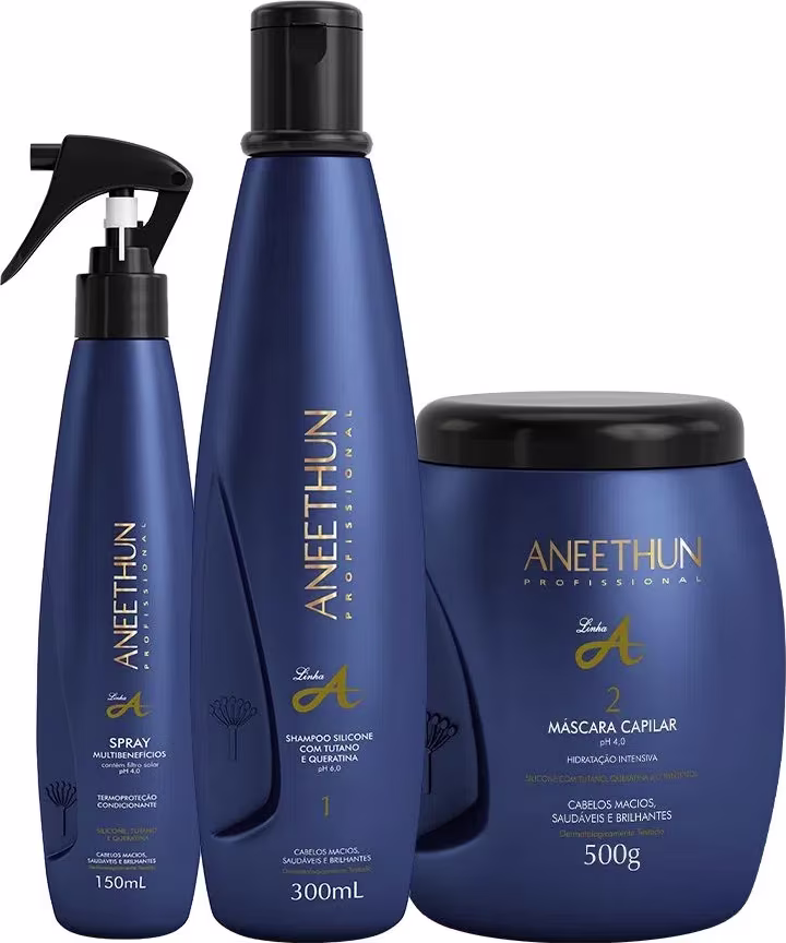 Spray multibenefícios em um frasco azul escuro de 150ml, um shampoo de silicone com tutano e queratina em um frasco azul escuro de 300ml, e uma máscara capilar em um pote azul escuro de 500g.