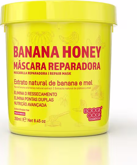Pote amarelo com rótulo "Banana Honey Máscara Reparadora", contendo extrato natural de banana e mel, indicado para eliminar ressecamento e pontas duplas, com nutrição avançada.