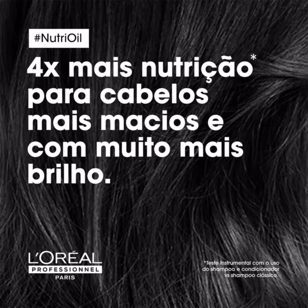 É um anúncio publicitário. O texto em destaque anuncia "4x mais nutrição para cabelos mais macios e com muito mais brilho". A imagem de fundo mostra cabelos escuros e brilhantes.