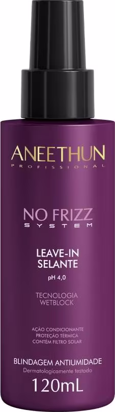 A imagem mostra o leave-in de Aneethun No Frizz System. Seu frasco é cilíndrico na cor vinho com tampa em spray.