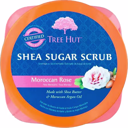 Embalagem circular laranja e rosa contendo Esfoliante de Açúcar de Manteiga de Karité da marca Tree Hut, com aroma de Rosa Marroquina, feito com Manteiga de Karité e Óleo de Argan Marroquino.