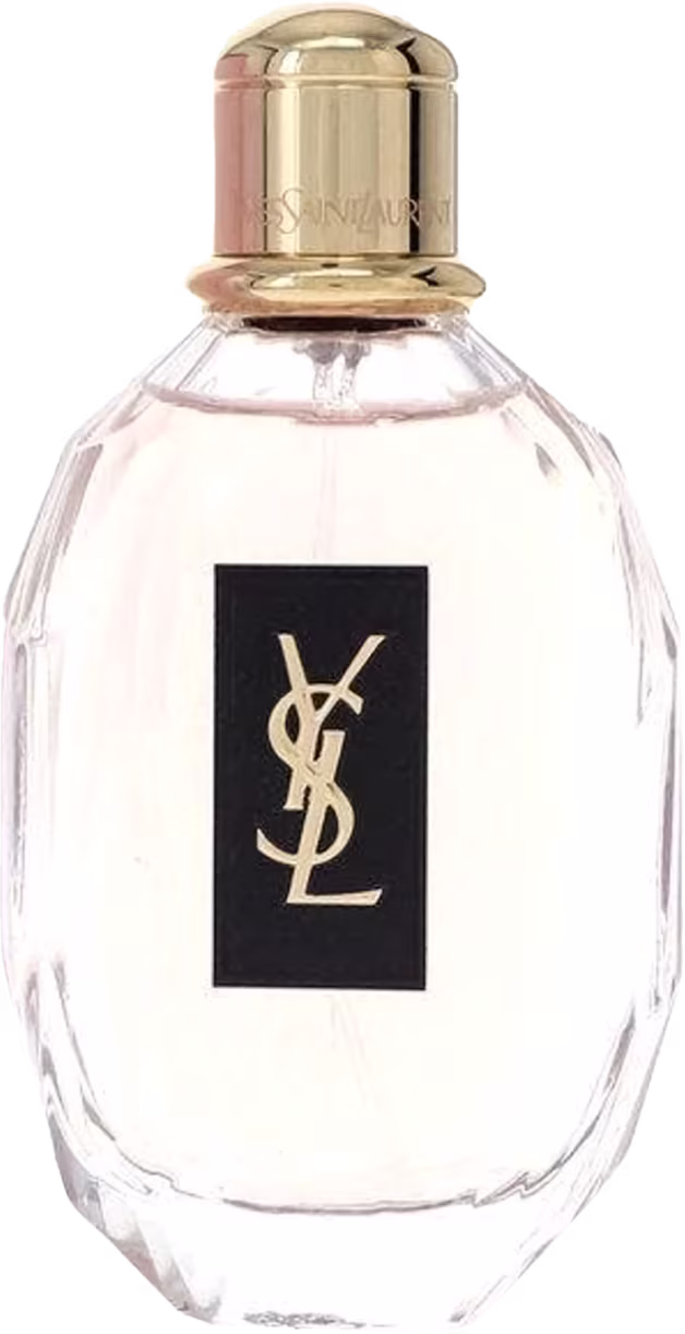 Perfume em frasco oval transparente com tampa dourada. O frasco apresenta uma etiqueta preta retangular com o logotipo "YSL" em dourado. O design é minimalista e elegante, típico dos produtos de luxo da marca Yves Saint Laurent.