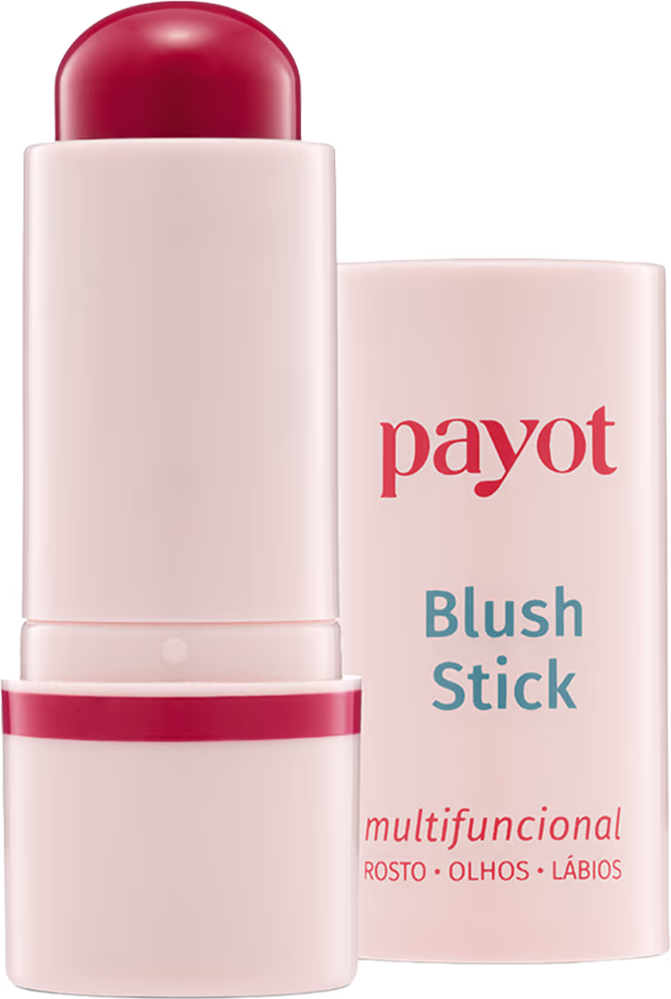 Bastão de blush rosa da marca Payot, com embalagem branca e vermelha, apresentando texto legível "Blush Stick" e "multifuncional" na parte frontal.