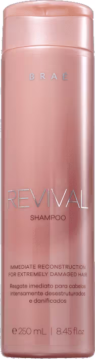 Shampoo Revival da marca Braé. Embalagem cilíndrica de plástico rígido na cor rosa claro metálico. Rótulo com o nome do produto "Revival Shampoo". Tamanho de 250ml ou 8.45fl oz indicado na parte inferior do frasco. Design minimalista e elegante.