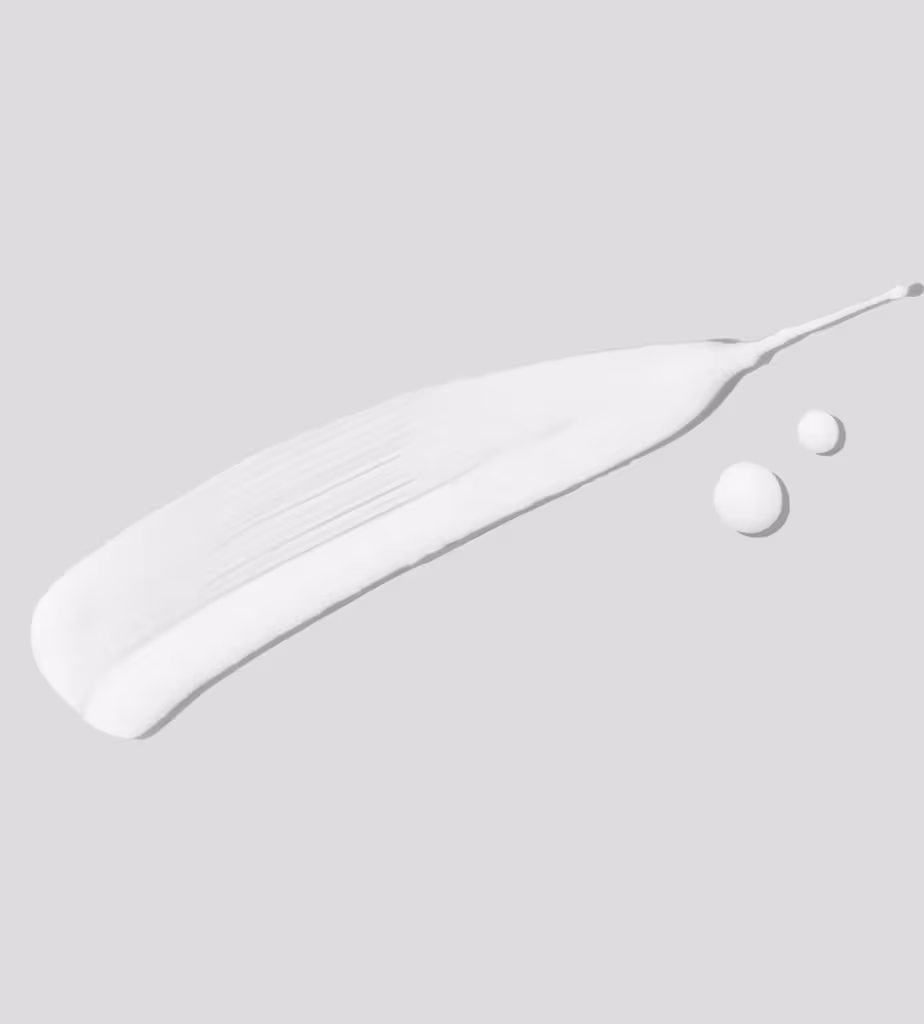 A imagem mostra o produto numa superfície indicando textura e cor branca.