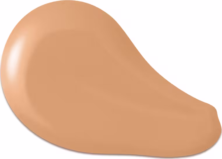 O produto apresentado na imagem é uma base de maquiagem de cor bege, com uma textura cremosa e suave. Sua forma é arredondada e convexa. Não há rótulos, marcas ou outras informações visíveis na imagem.