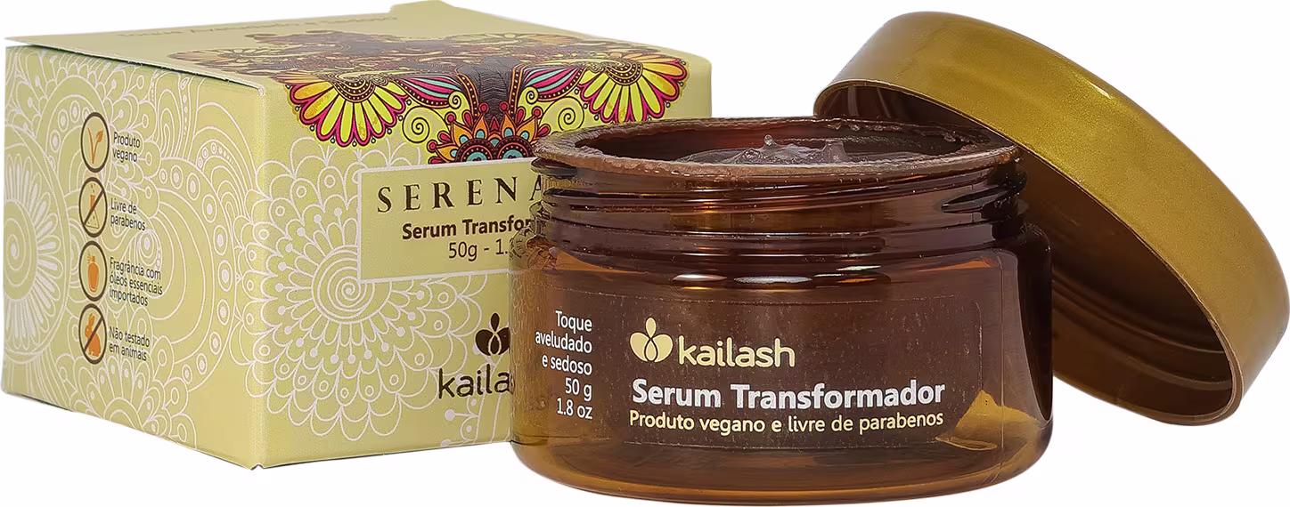 Caixa de papelão amarela com padrões florais e frasco de vidro marrom contendo Serum Transformador da marca Kailash, um produto vegano e livre de parabenos, com 50g de conteúdo.
