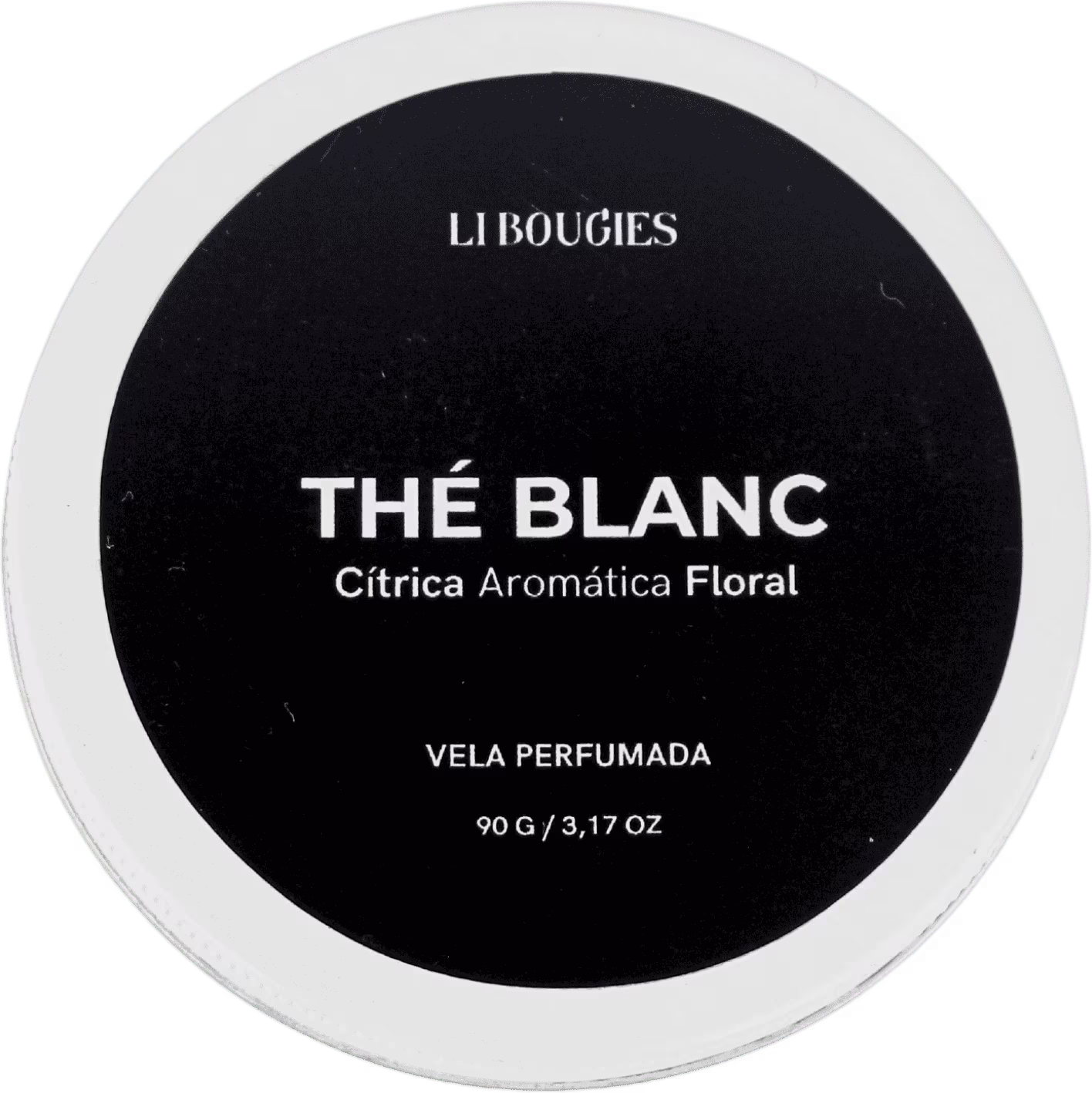Vela perfumada da marca LIBOUGIES, com o nome "THE BLANC" impresso no rótulo. O rótulo também indica que a fragrância é "Cítrica Aromática Floral". A vela está em uma embalagem circular preta e branca, com o nome da marca e do produto claramente visíveis.