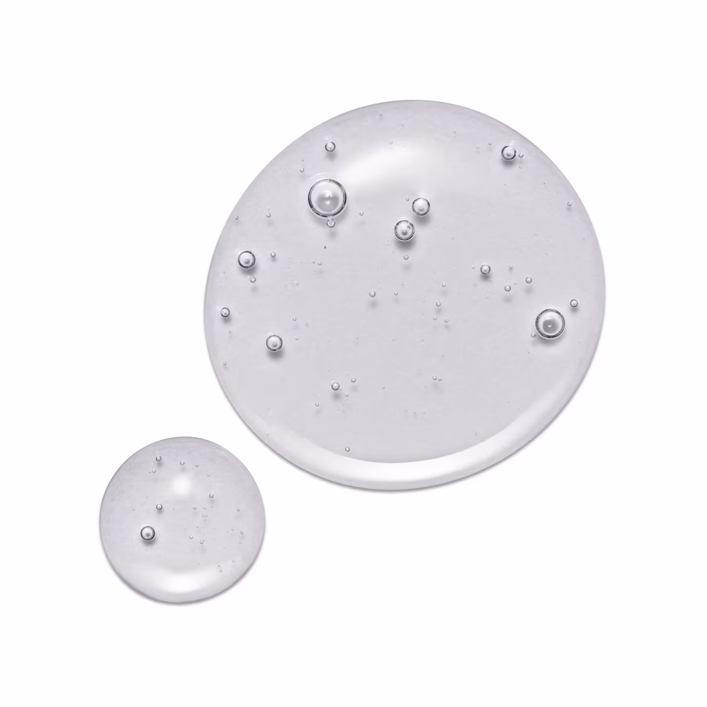 Shampoo da linha Blond Revolution da marca TRUSS. Imagem de uma gota do produto.