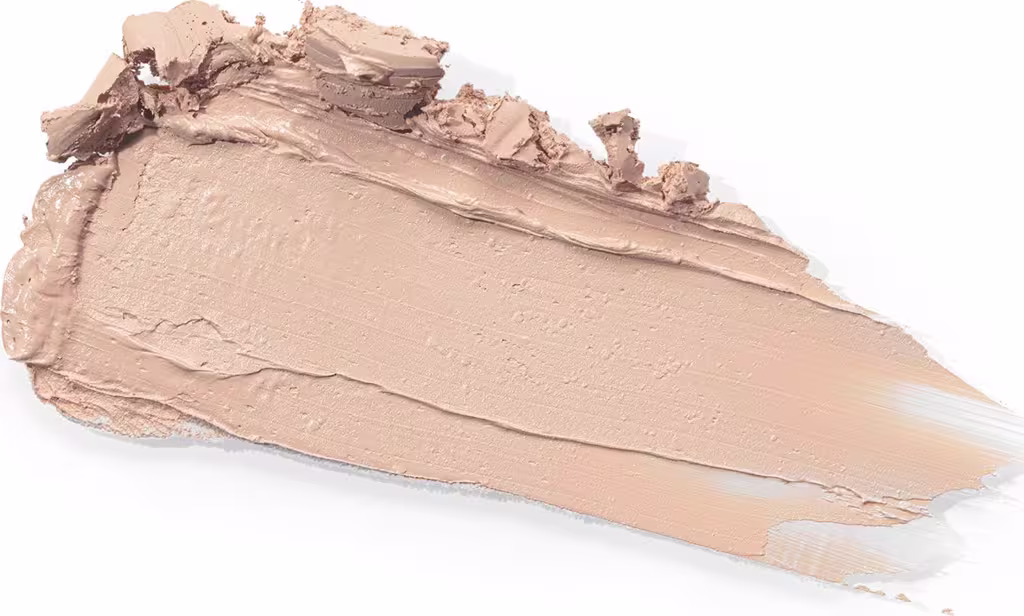 Textura cremosa e suave, com tonalidade bege clara e leve brilho. Apresenta consistência densa e uniforme, indicando um produto de alta qualidade.
