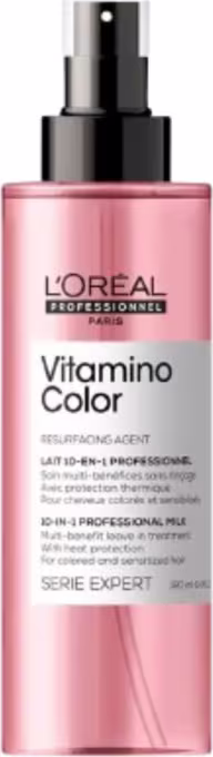 Frasco rosa com pulverizador preto da linha Vitamino Color da L'Oréal Professionnel, um produto de tratamento para cabelos coloridos.