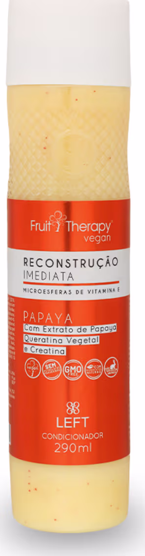 A imagem mostra um frasco de condicionador da linha Fruit Therapy Vegan da marca Left. O frasco tem rótulo laranja com tampa branca e capacidade de 290ml. É um condicionador de aspecto cremoso e opaco para reconstrução capilar.