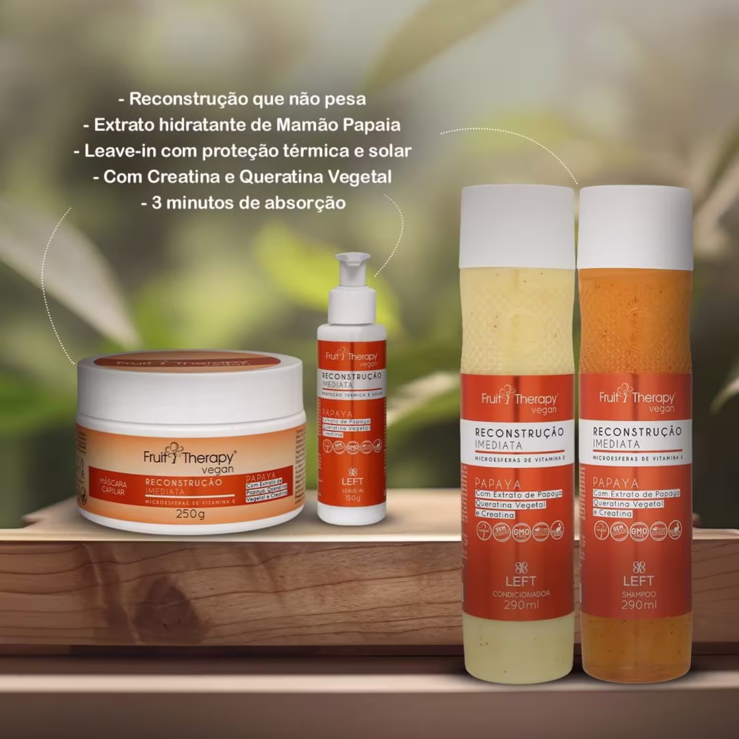 A imagem apresenta a linha de produtos "Fruit Therapy Vegan" voltada para a reconstrução capilar. Os produtos exibidos incluem frascos laranja com tampa branca. São eles máscara, leave-in spray, shampoo e condicionador.