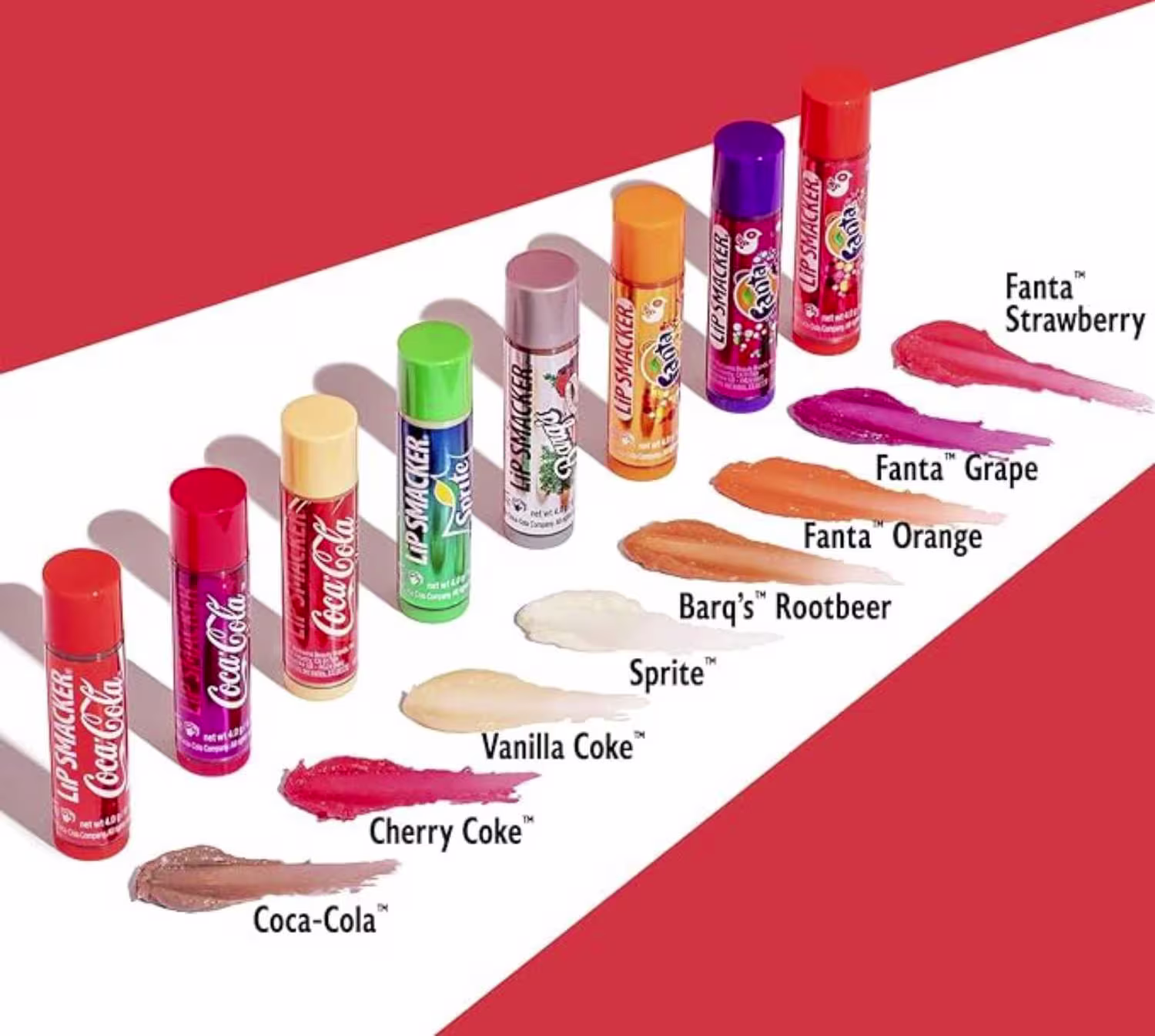 Este é um conjunto de lip balms lip smacker da Coca-Cola. O produto vem em uma embalagem vermelha com o logotipo "Lip Smacker Coca-Cola" em letras brancas. Inclui vários batons em formatos de bastão, com tampas coloridas.