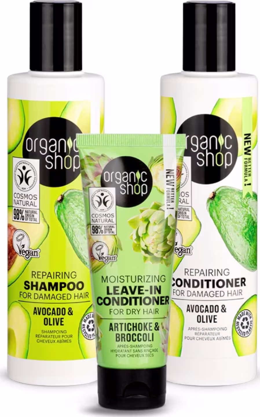 A imagem mostra dois frascos plásticos brancos com tampas pretas contendo shampoo e condicionador reparadores para cabelos danificados à base de abacate e azeite. Um tubo menor verde com tampa preta contendo um leave-in.