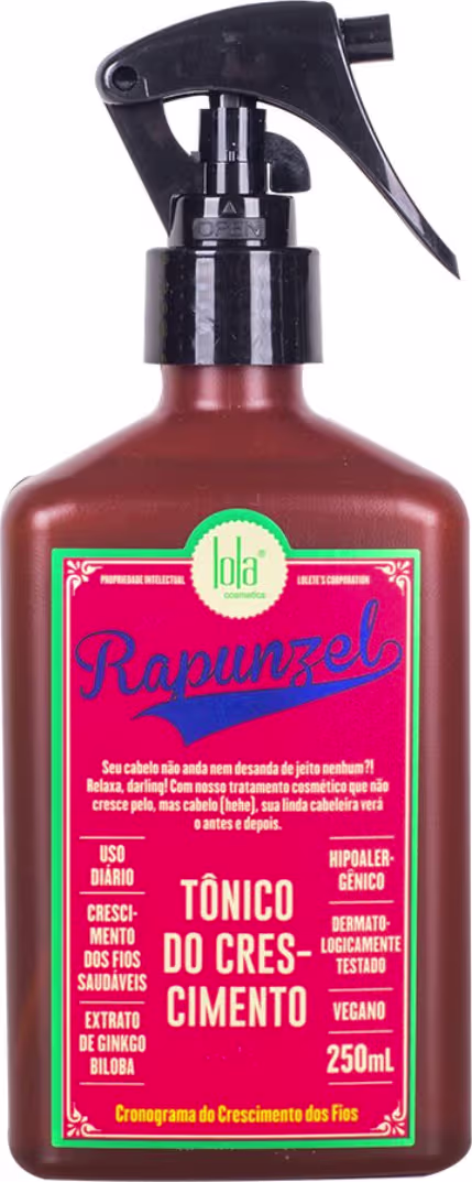 A imagem mostra o tônico, seu frasco é retangular marrom, rótulo vermelho com detalhes em amarelo, azul e verde e possui uma tampa preta de válvula spray.