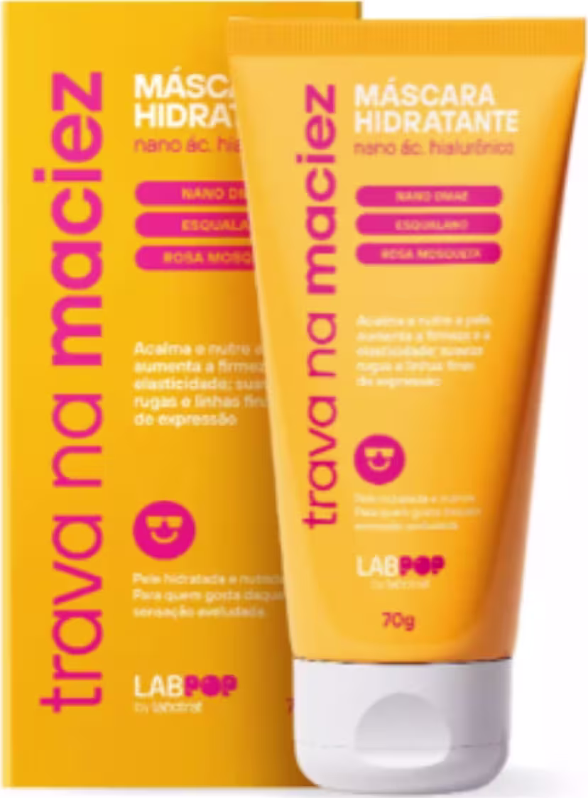O produto apresentado é uma máscara hidratante da marca Labotrat. A embalagem é um tubo de cor amarela com detalhes em rosa, contendo o nome da marca e do produto. Volume de 70g.