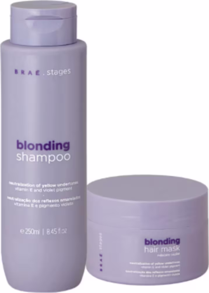 Dois produtos da linha Braé Stages: um frasco de shampoo e um pote de máscara capilar, ambos em tons de roxo, com rótulos indicando que são produtos para loiros.