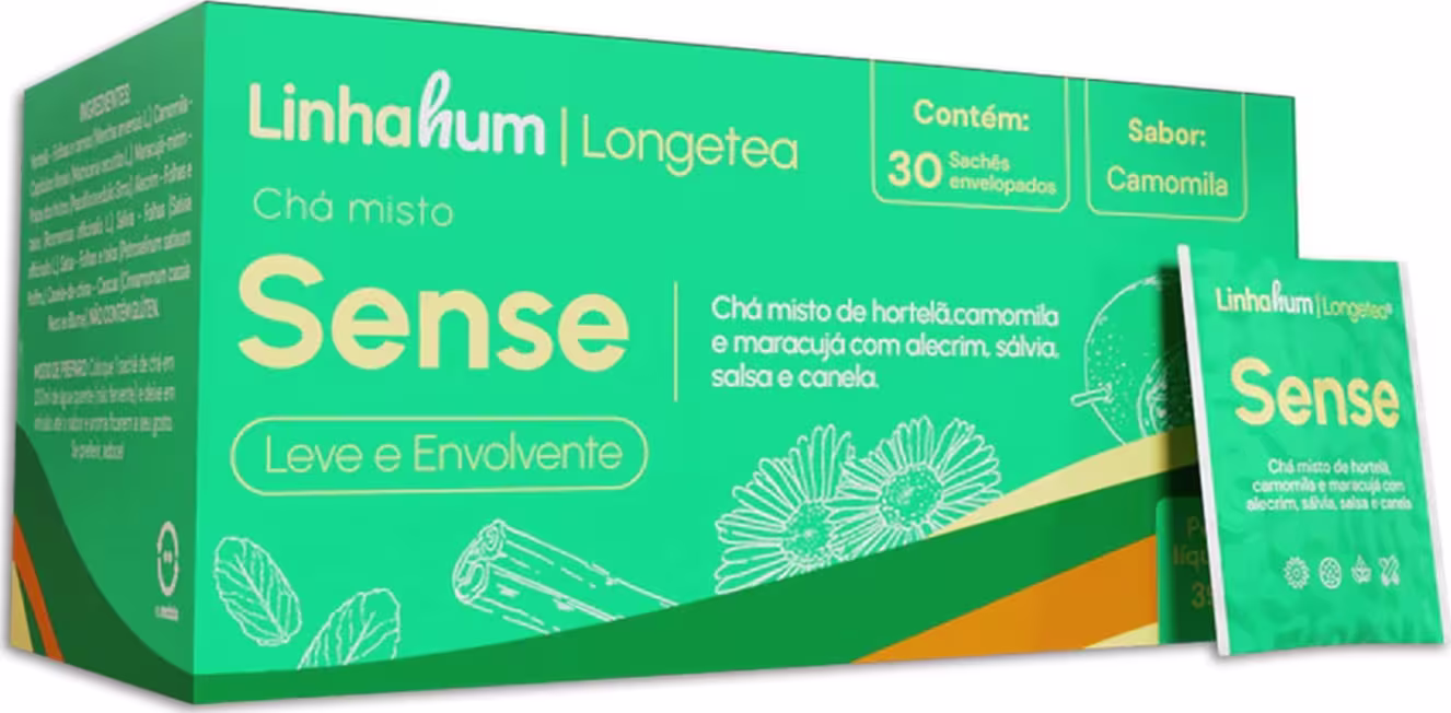 Caixa de chá misto da marca Linhahum, com o nome "Sense". A caixa é verde e contém 30 sachês de chá com sabor de camomila. O texto na embalagem indica que o chá é uma mistura de ervas, incluindo hortelã, camomila, maracujá, alecrim, sálvia e canela.
