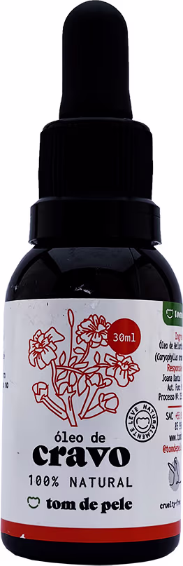 Óleo de cravo 100% natural da marca Tom de Pele. O frasco possui um conta-gotas preto e um rótulo branco com o nome do produto e informações sobre sua composição natural. A embalagem é simples e minimalista, com uma cor predominantemente preta.