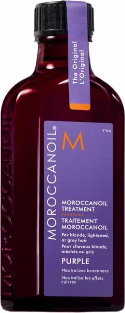 Frasco de tratamento de óleo de argan Moroccanoil na cor roxa, com rótulo destacando o tratamento para cabelos loiros, claros ou grisalhos.
