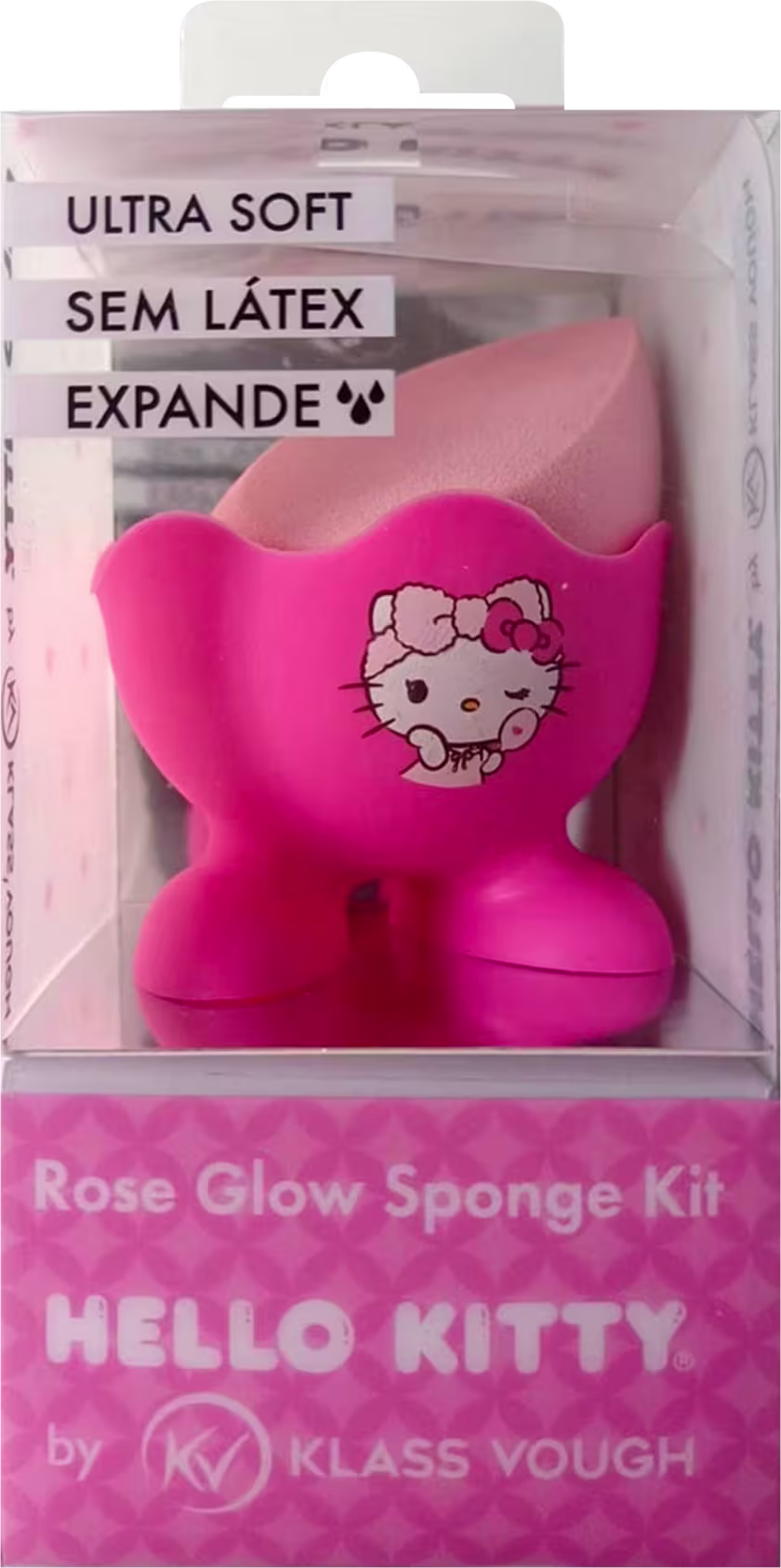 A imagem mostra a esponja dentro de uma embalagem transparente e quadrada.