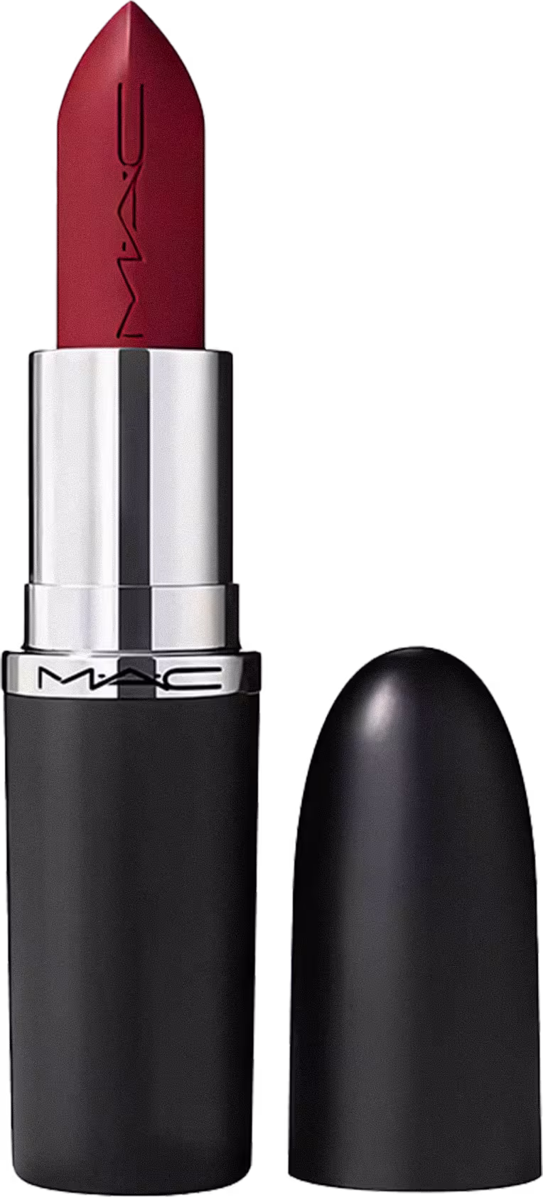 A imagem mostra um batom tipo bala, rosa, com a tampa ao lado. A embalagem é preta e prata com o logo da marca em preto.