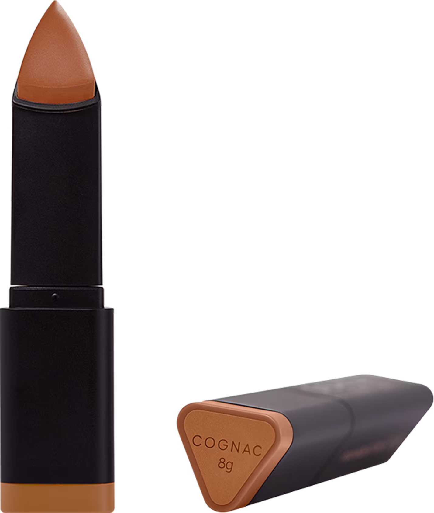 A imagem mostra detalhe da embalagem e da base Océane Edition Foundation Stick no tom Cognac que possui uma ponta cônica na cor marrom. As cores predominantes são preto, bege e dourado.