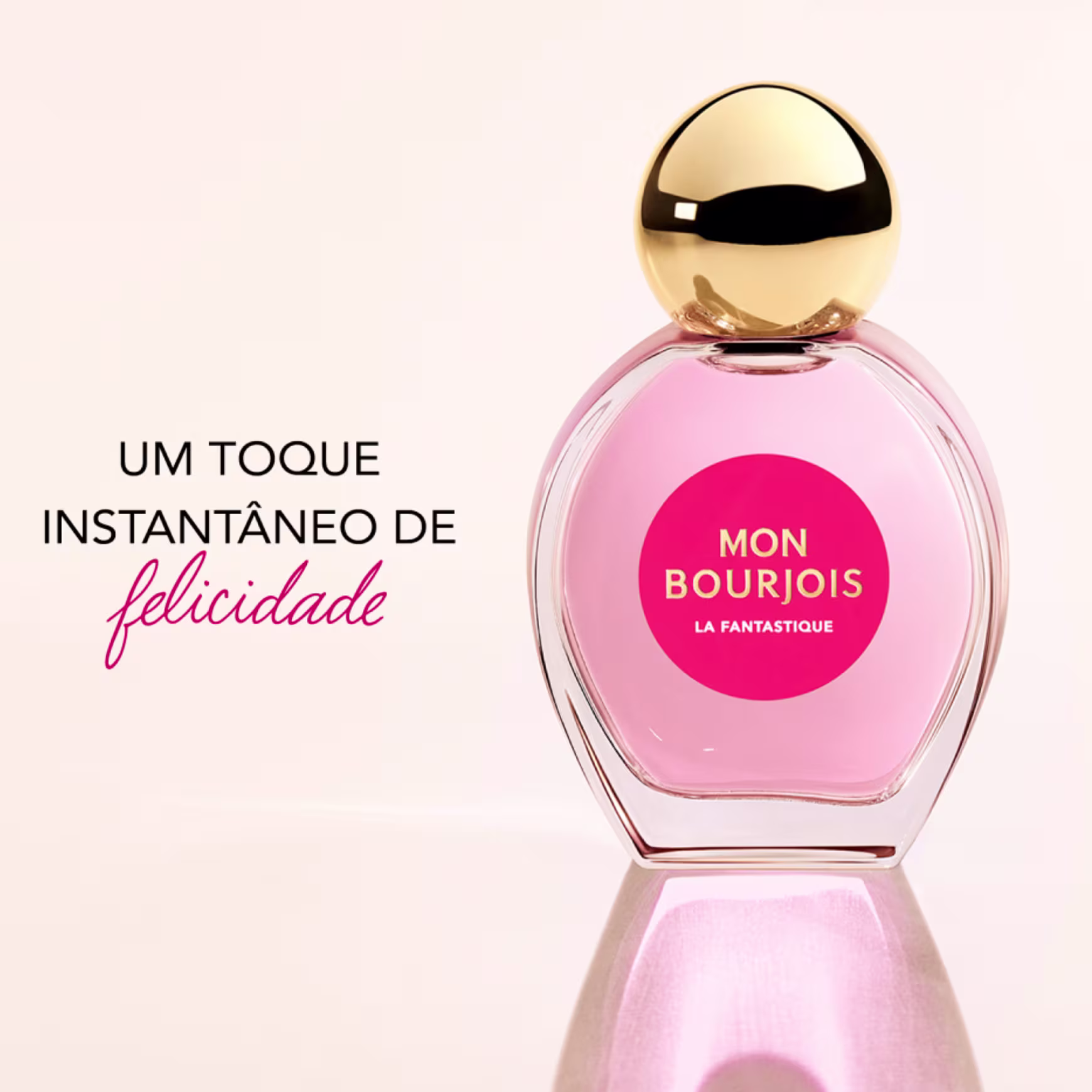Um toque instantâneo de felicidade" em letras rosa cursivas. Produto reflete luz, criando um efeito brilhante.