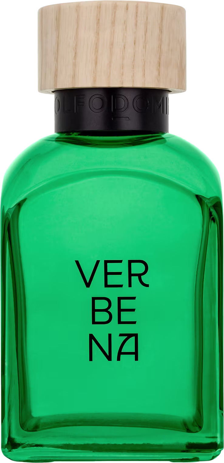 Frasco de perfume da marca Adolfo Dominguez, com um design moderno e minimalista. O frasco possui uma forma cilíndrica com uma tampa de madeira, e a cor predominante é um verde vibrante. O rótulo do produto exibe o nome "VERBENA" em letras pretas.