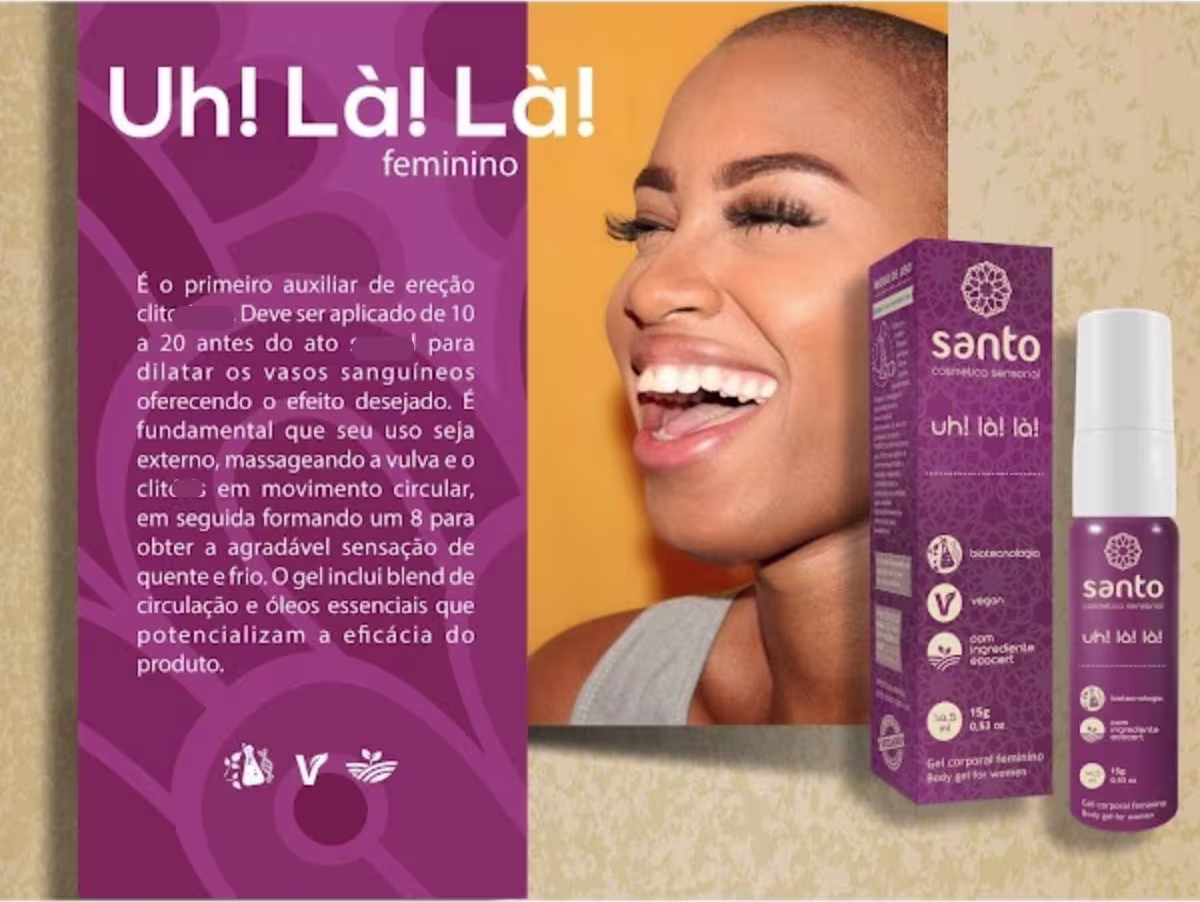 A imagem mostra a embalagem e uma caixa retangular na cor roxa. Há uma imagem de uma mulher sorridente com pele escura e cabelo raspado. O texto ao lado destaca informações sobre o produto.