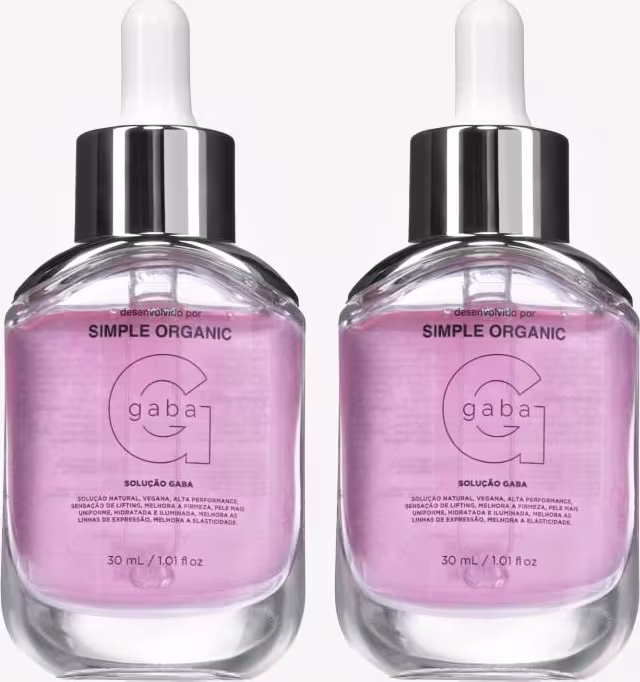 Dois frascos de vidro com soro facial da marca Simple Organic, com rótulo rosa e branco, contendo 30 ml de produto cada, com pipeta aplicadora e tampa preta.