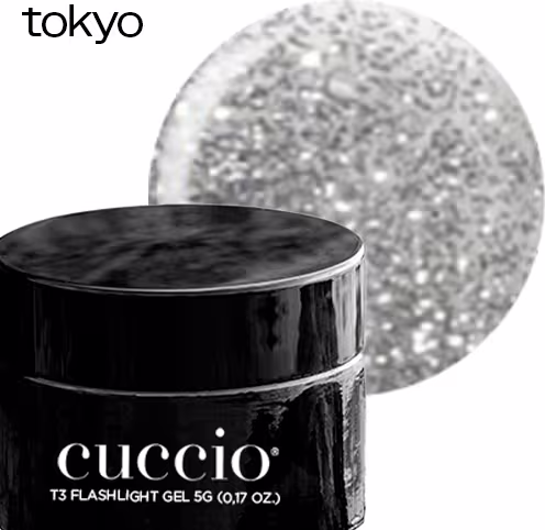 Gel para construção de unhas com o nome "T3 Flashlight Gel 5G" impresso no frasco preto. O frasco é redondo e possui uma tampa preta. Ao lado do frasco, há uma esfera brilhante e translúcida, que parece ser uma amostra do produto.