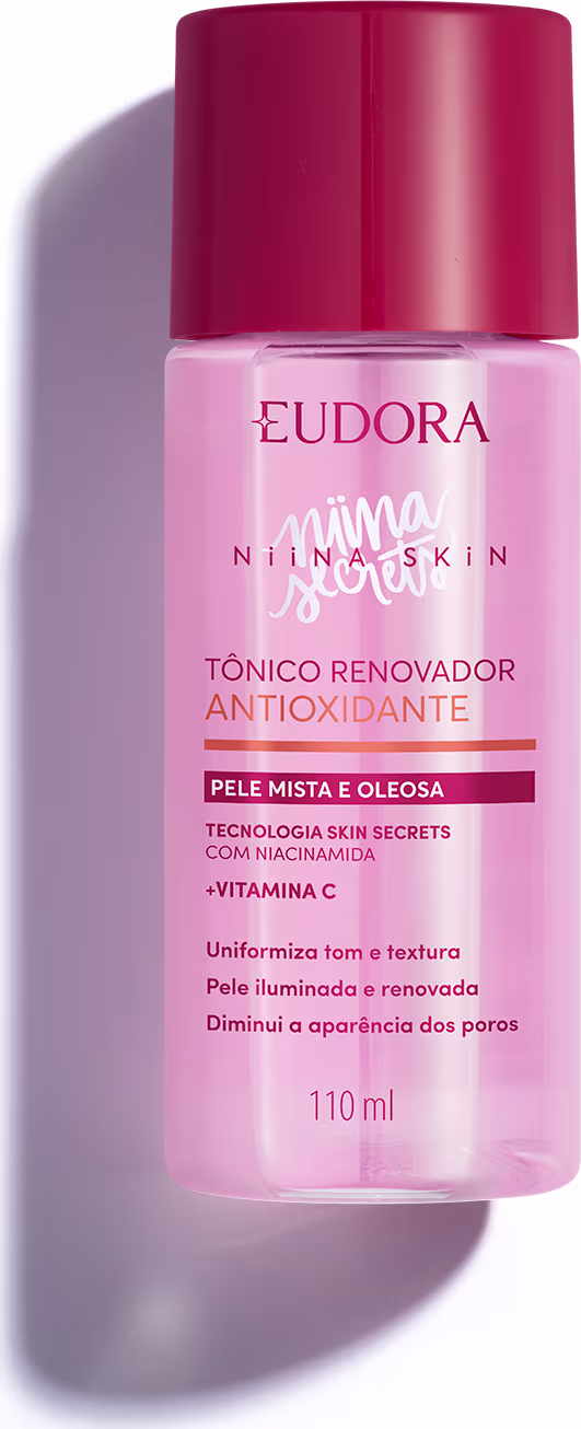 A imagem mostra um frasco plástico, de frente, pequeno, redondo, transparente de cor rosa, com líquido também rosa e tampa transparente rosa. É um frasco pequeno, com logo da marca e linha do produto escrito com letras rosa e branco.