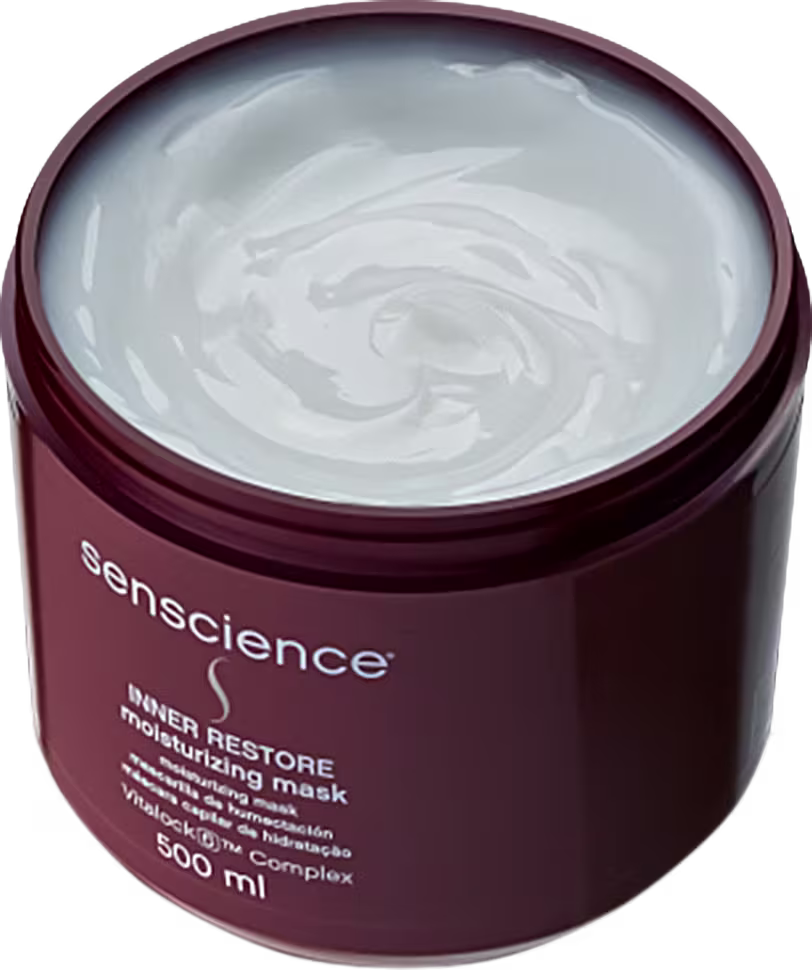 Pote de máscara hidratante restauradora Inner Restore da marca Senscience. Embalagem redonda de plástico marrom escuro com tampa da mesma cor. O interior contém uma máscara cremosa de cor branca.