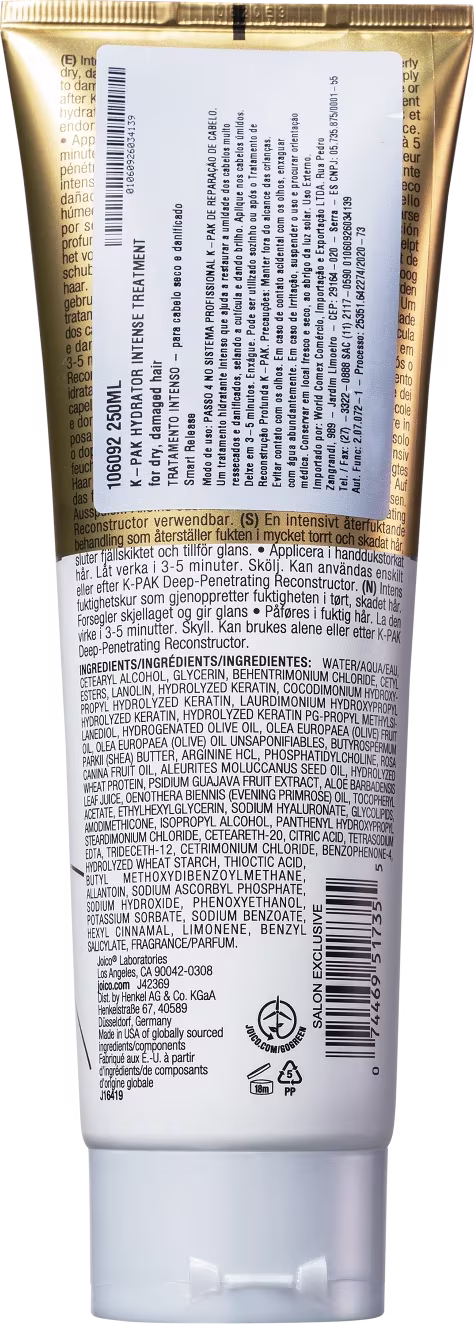 Este é um tubo de plástico branco e dourado contendo um produto de tratamento capilar da marca Joico. A embalagem tem uma tampa branca e o corpo é predominantemente dourado metálico.