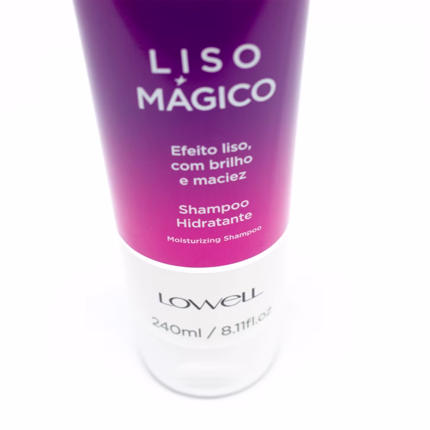 Shampoo hidratante Liso Mágico da marca Lowell. Embalagem tubular rosa vibrante com detalhes em branco. Rótulo com o nome do produto "Liso Mágico" em letras brancas.